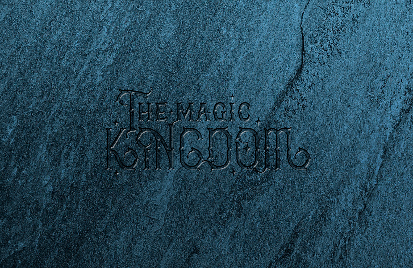 logo-brand-design-the-magic-kingdom-hayes-chiselled-into-stone